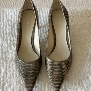 Nine West snake skin looking shoes.
